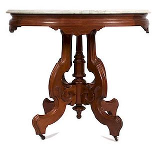A Victorian Marble Top Parlor Table Height 29 x width 33 x depth 23 1/2 inches.