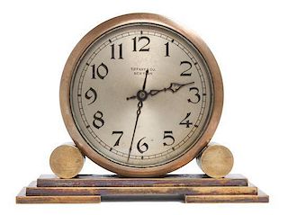 * An Art Deco Brass Desk Clock Height 4 7/8 x width 6 3/8 x depth 2 1/4 inches.