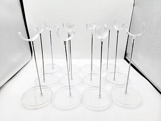 Group of 12 Plastic Doll Stands - Gene