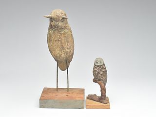Two folky owl carvings.
