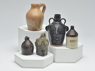 Unique group of five miniature jugs.