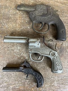 Three Cap Guns