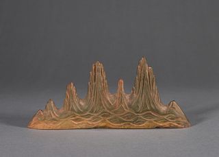 A seawater and cliff patterned inkstone brush stand
