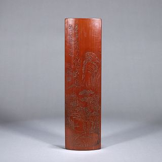 A landscape and figure carved bamboo arm rest