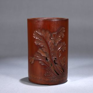 A flower and plant carved  bamboo brush pot