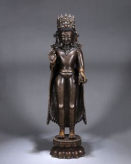 A silver inlaid copper Sakyamuni buddha statue
