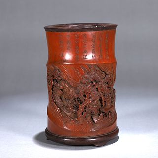 A carved  bamboo brush pot