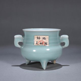 A Longquan kiln celadon porcelain double-eared three-legged censer