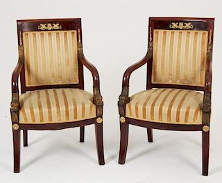 PAIR OF EMPIRE REGENCY BRONZE MOUNTED DOLPHIN CARVED ARM CHAIRS