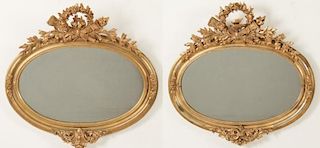 PAIR OF LOUIS XV STYLE CARVED GILTWOOD OVAL MIRRORS