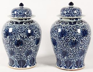 PAIR OF DECORATIVE CHINESE BLUE AND WHITE COVERED PORCELAIN JARS