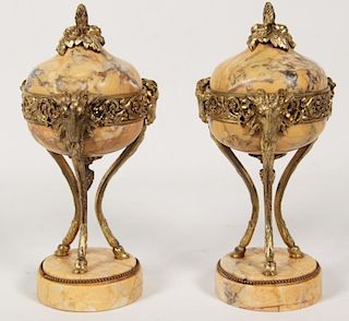 PAIR OF FRENCH REGENCY STYLE MARBLE COUPS WITH BRONZE RAM'S HEAD MOUNTS