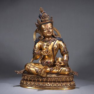 A gem inlaid copper vajrasattva statue