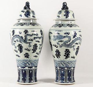 PAIR OF LARGE BLUE AND WHITE CHINESE PORCELAIN CAPPED PALACE URNS