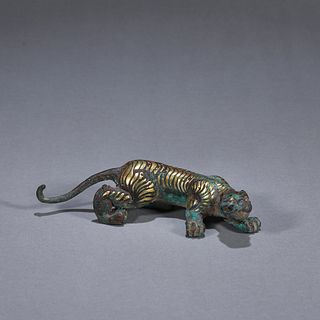 A gold and silver inlaid bronze tiger ornament