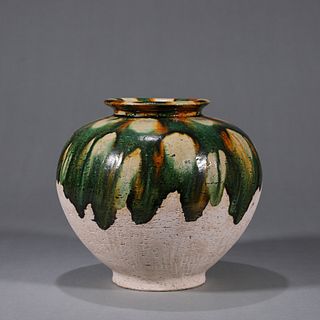 A tri-colored porcelain jar