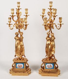 PAIR OF FRENCH DORE BRONZE FIGURAL AND SEVRES MOUNTED 6 LIGHT CANDELABRA