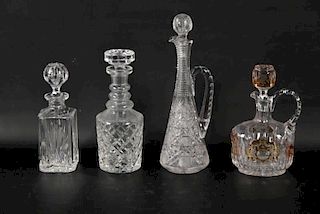 MISCELLANEOUS LOT OF 4 CUT GLASS DECANTERS