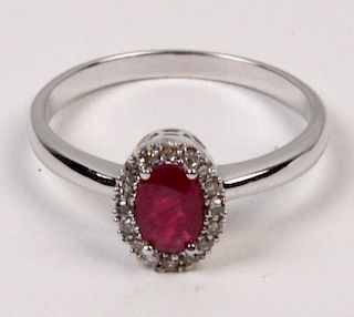 14K WHITE GOLD DIAMOND AND RUBY LADY'S RING HAVING 0.41 CT RUBY AND O.O7 CTW DIAMONDS