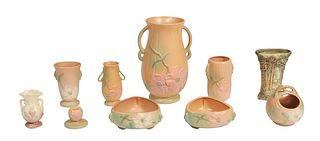 Group of Ten Pieces of Weller Pottery, consisting of a cylindrical basket, two triangular low bowls, a low candlestick, a cylindrical floral relief ha