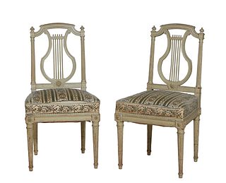 Pair of French Louis XVI Style Polychromed Beech Side Chairs, early 20th c., the arched back with a vertical lyre form splat, flanked by reeded tapere