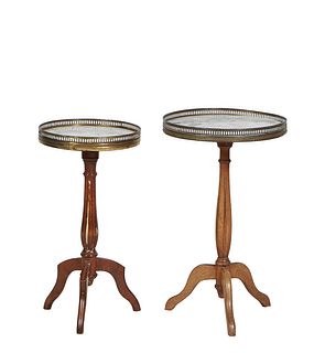 Two Louis XVI Style Carved Walnut Gueridons, 20th c., the brass galleried figured white marble top, on a tapered reeded support to tripodal legs, H.- 