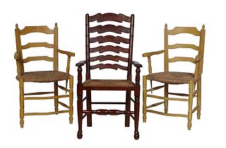 Group of Three French Provincial Rushseat Ladderback Armchairs, early 20th c., two in polychromed yellow, with bowed seats and turned legs; together w