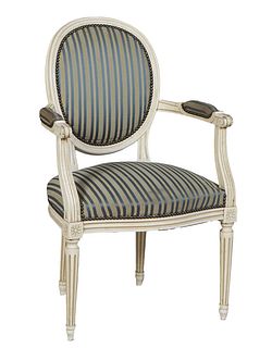 French Louis XVI Style Polychromed Beech Fauteuil, the cushioned canted medallion back to upholstered scrolled arms flanking a bowed cushioned seat, o