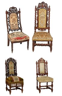 Four French Louis XIII Style Carved Walnut Hall Chairs, 19th c., the taller with a pierced carved crest over a cushioned back flanked by rope twist su