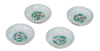 Set of Four Chinese Doucai Shallow Dipping Bowls, 20th c., with Famille Rose and floral decorations, the underside with a spurious Kang Hsi mark, H.- 