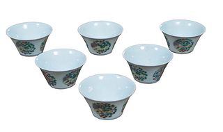 Set of Six Chinese Doucai Porcelain Tea Cups, 20th c., with exterior floral decoration, the underside with an underglaze Kang Hsi mark, H.- 1 3/44 in.