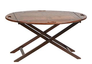 English Carved Oak Butler's Tray Coffee Table, early 20th c., on a folding oak stand, H.- 19 1/4 in., W.- 36 3/4 in., D.- 26 3/4in.