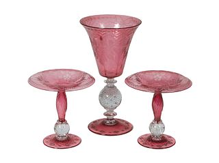 Three Piece Blown Etched Pink Glass Garniture Set, early 20th c., consisting of a trumpet vase and a pair of compotes, with floral etching, Vase- H.- 