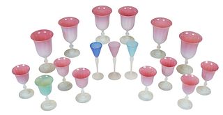Seventeen Piece Set of Opaline Art Glass Stemware, 20th c., consisting of 6 red wines, 8 sherry glasses and three liqueur stems, in varying colors. (1
