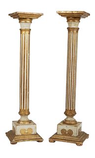 Pair of Florentine Style Gilt and Polychromed Wood Pedestals, 20th c., the square top on a reeded columnar support to a stepped square base, H.- 37 in
