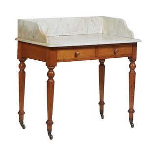 French Carved Walnut Marble Top Washstand, late 19th c., the three-quarter figured white marble splash, over stepped rounded edge and corner top, over