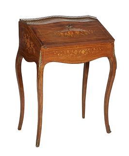 French Louis XV Style Ormolu Mounted Marquetry Inlaid Slant Front Desk, 20th c., with a 3/4 brass galleried top over a bombe slant front with an inset