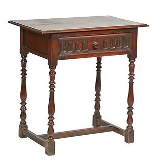 French Provincial Louis XIV Style Writing Table, c. 1900, the ogee edge top over a reeded frieze drawer, on turned tapered cylindrical reeded and bloc
