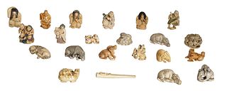Group of Twenty-One Carved Ivory Netsukes, early 20th c., consisting of 13 animals, and 8 figural examples, 17 signed on the bottom, together with an 