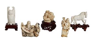 Group of Five Oriental Ivory Carvings, 20th c., one Japanese of a Hotei holding a staff; one Chinese of a sage holding a scroll, with scrimshaw decora