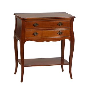 French Louis XV Style Carved Cherry Side Table, 20th c., the serpentine ogee edge top over a setback bank of two fielded panel drawers, on cabriole le