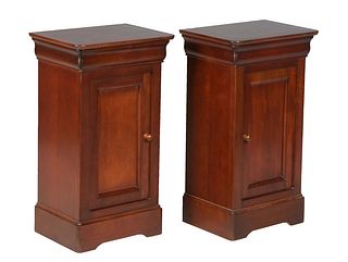Pair of Louis Philippe Carved Cherry Nightstands, early 20th c., the rounded corner rectangular top over a frieze drawer and a long cupboard door, on 