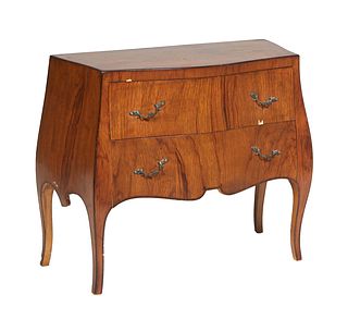 Diminutive French Carved Walnut Bombe Commode, 20th c., the bowed top over two frieze drawers flanked by bombe sides, on cabriole legs, H.- 29 1/4 in.
