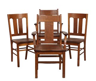 Set of Four Carved Oak Arts and Crafts Dining Chairs, early 20th c., consisting of a pair of armchairs and a pair of side chairs, the curved canted ve