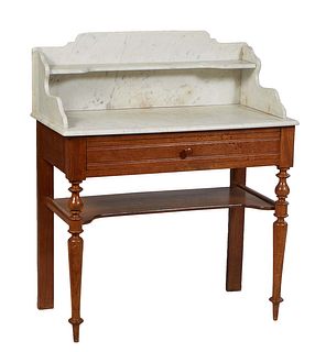 French Provincial Carved Oak and Beech Marble Top Washstand, 19th c., the arched back splash over an indented shelf, on two bracket supports to a dish