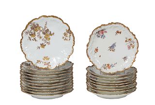 Set of Twenty Limoges Hand Painted Floral Porcelain Plates, 11 with rose decoration, and 9 with tree decoration with gilt highlights, H.- 1 in., Dia.-