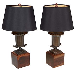 Pair of Antique Silvered Metal Urn Lamps, 20th c., mounted on mahogany plinths, H.- 14 in., W.- 4 7/8in., D.- 5 in.