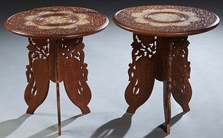 Pair of Indian Bone Inlaid Carved Shesham Wood Side Tables, 20th c., the circular top on a tripodal folding swan carved legs, H.- 18 1/2 in., Dia.- 17