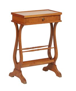 French Louis Philippe Carved Cherry Side Table, 20th c., the galleried rectangular top over a frieze drawer, on pierced trestle supports, joined by a 