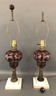 A Pair of Ruby Glass Lamps on Marble Bases